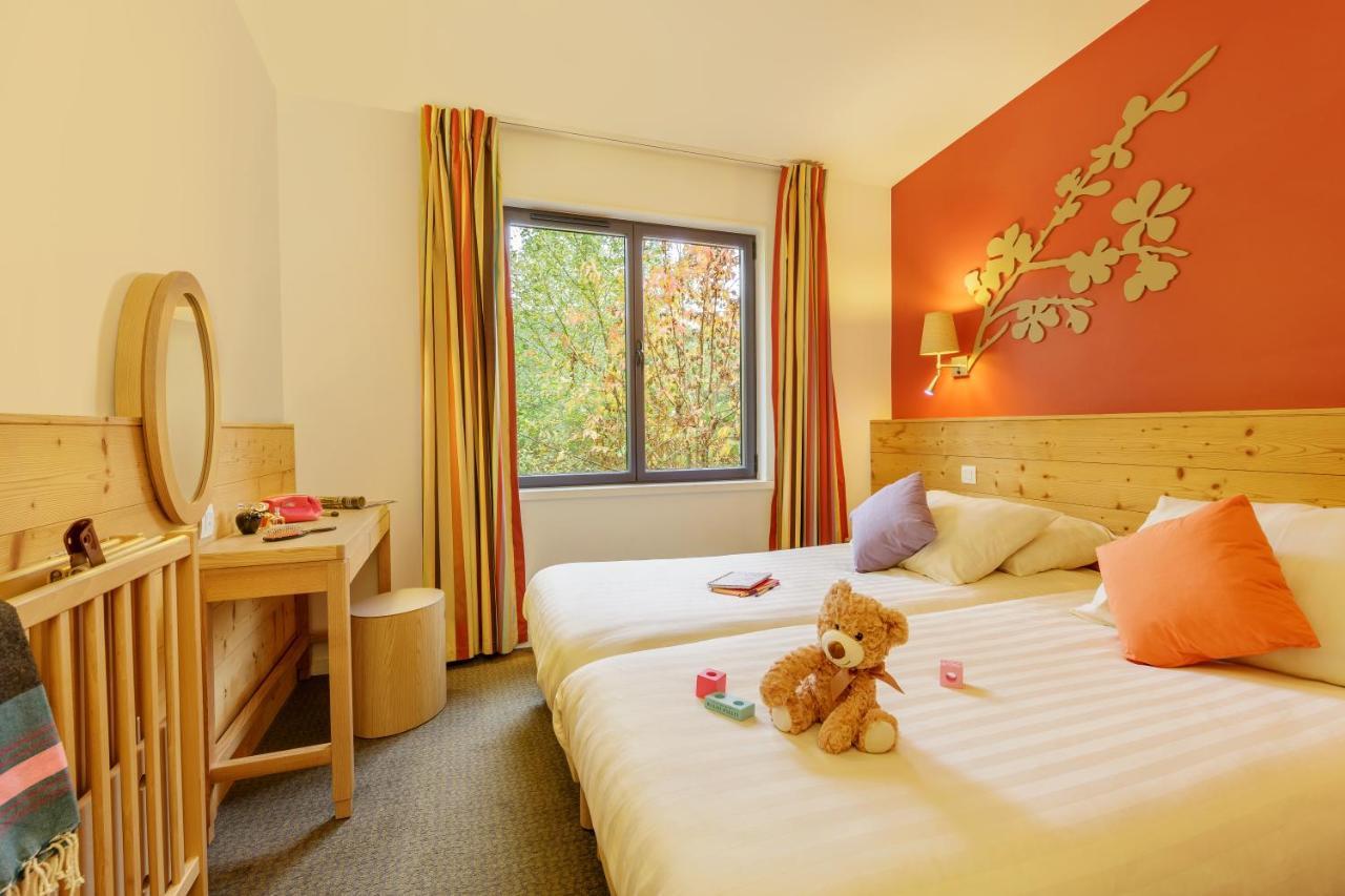 Center Parcs Les Hauts De Bruyeres Шомон-сюр-Тарон Экстерьер фото